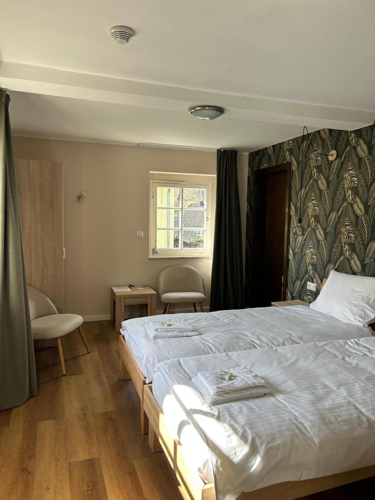 Garni Hotel Im Fachwerkhof ジンメラート 部屋 写真