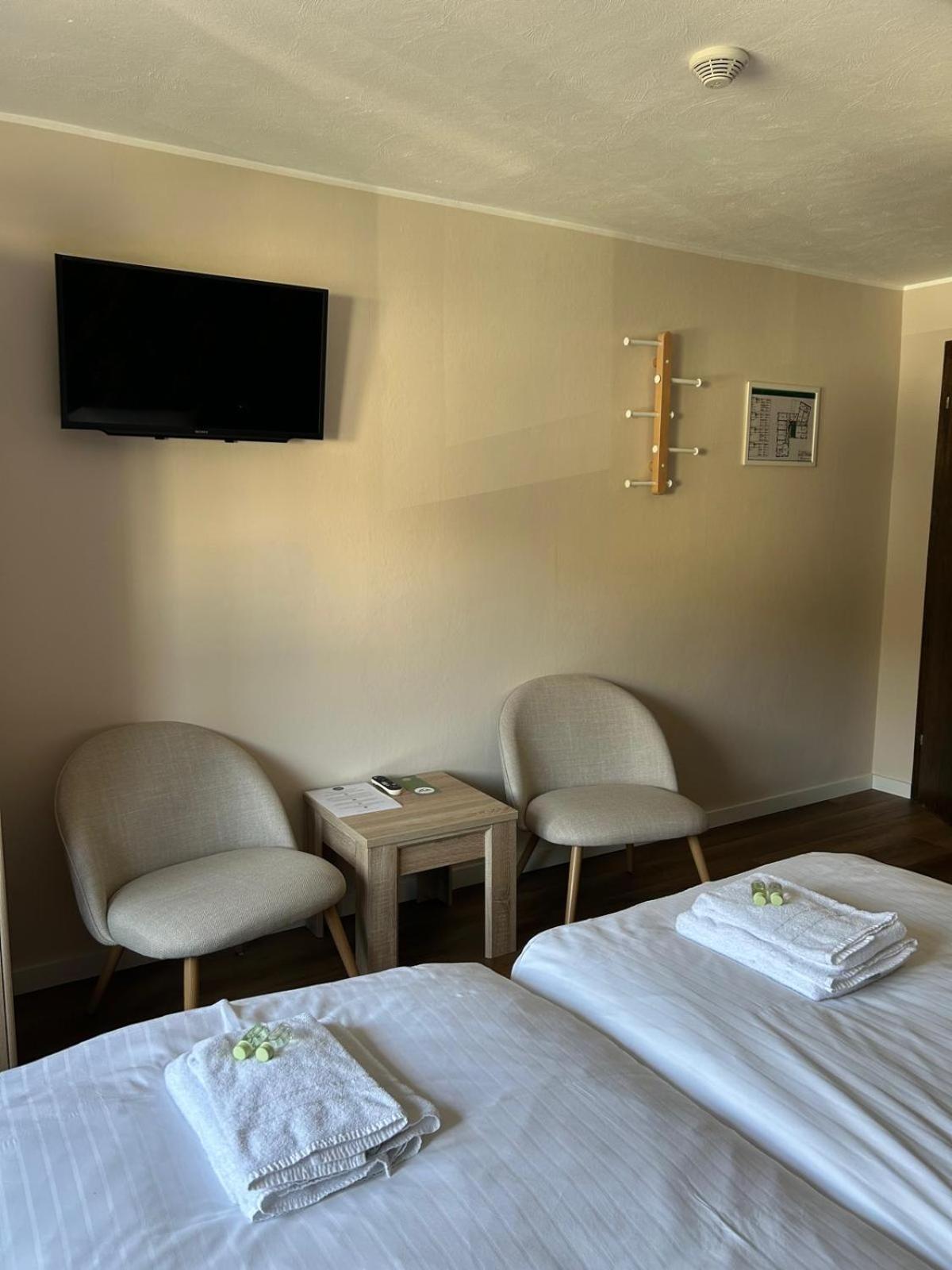 Garni Hotel Im Fachwerkhof ジンメラート 部屋 写真